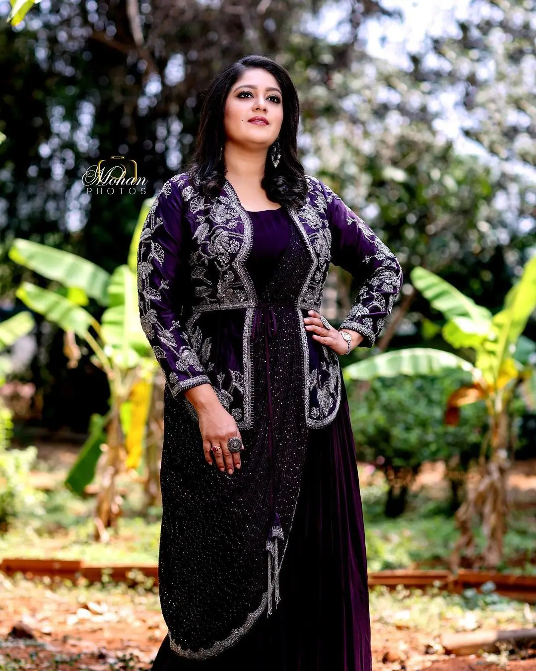 Meghana Raj Wearing Beautiful Earring Black Designer Gown